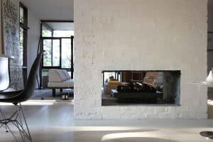 Mid Century at Pearl Beach by Brian Mazlin living room fire place brick