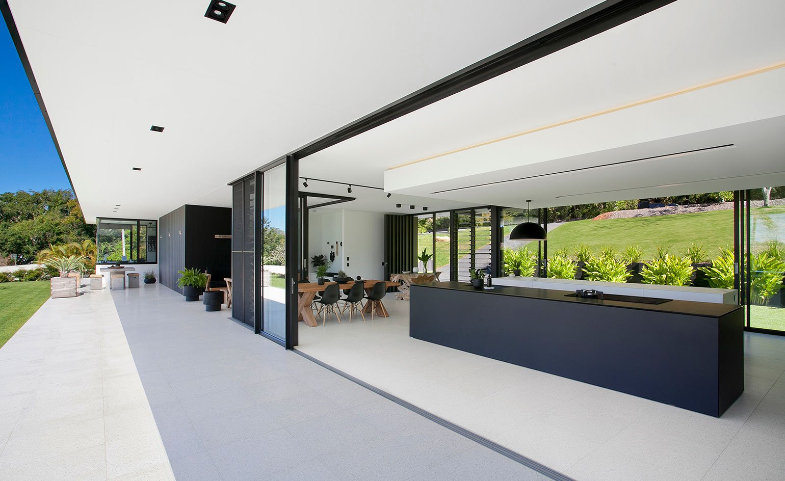 Contemporary house - architect Sarah Waller’s Doonan Glass House - kitchen view from outside