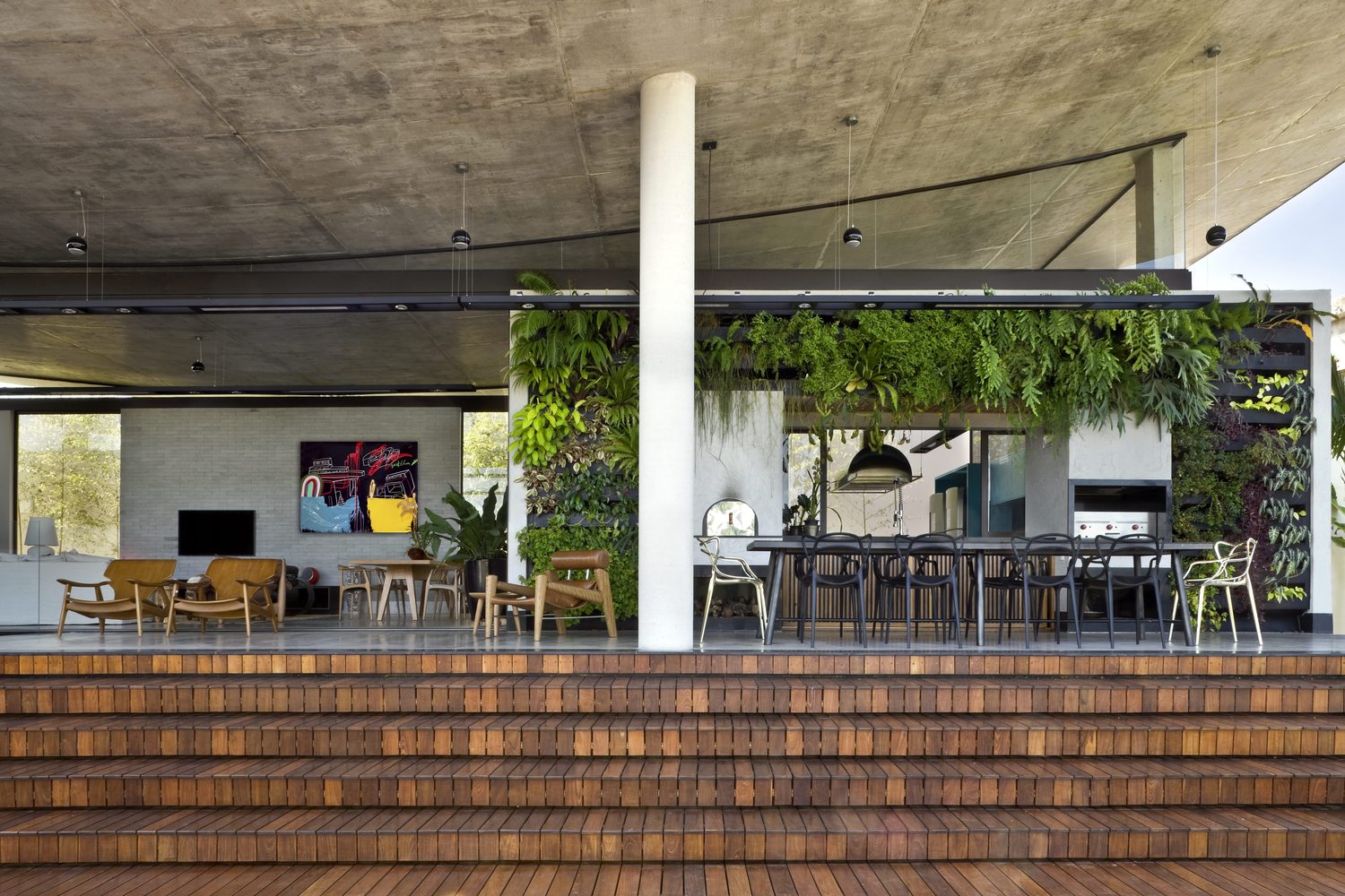 climbing house - contemporary house in Brazil by leo romano - dining and living area