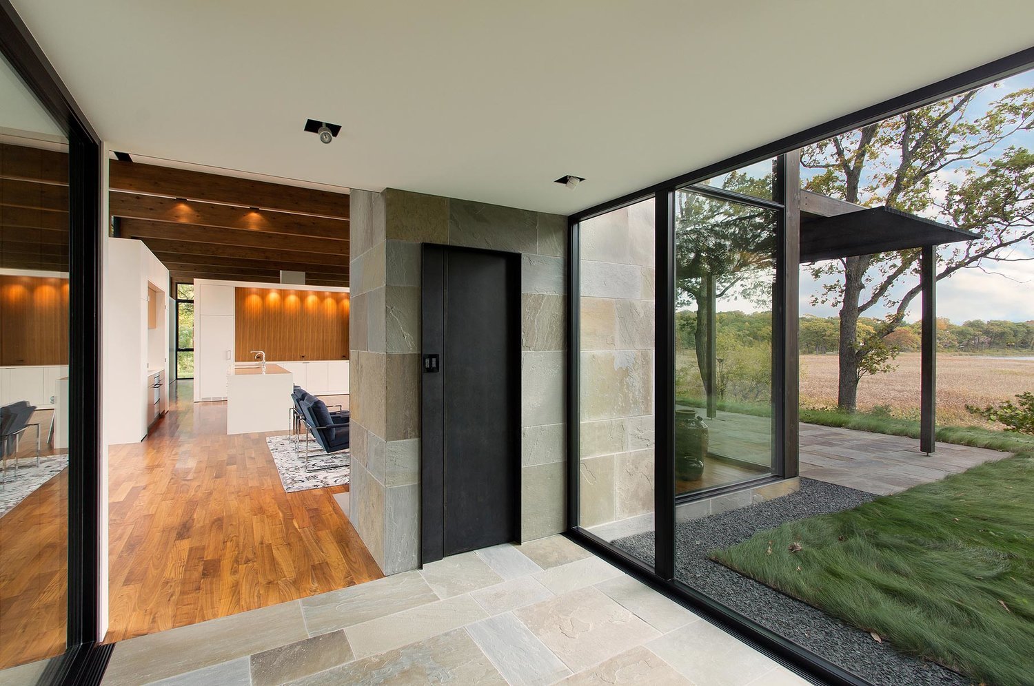 Modernist Woodland House - Altus architecture - inside entrance view