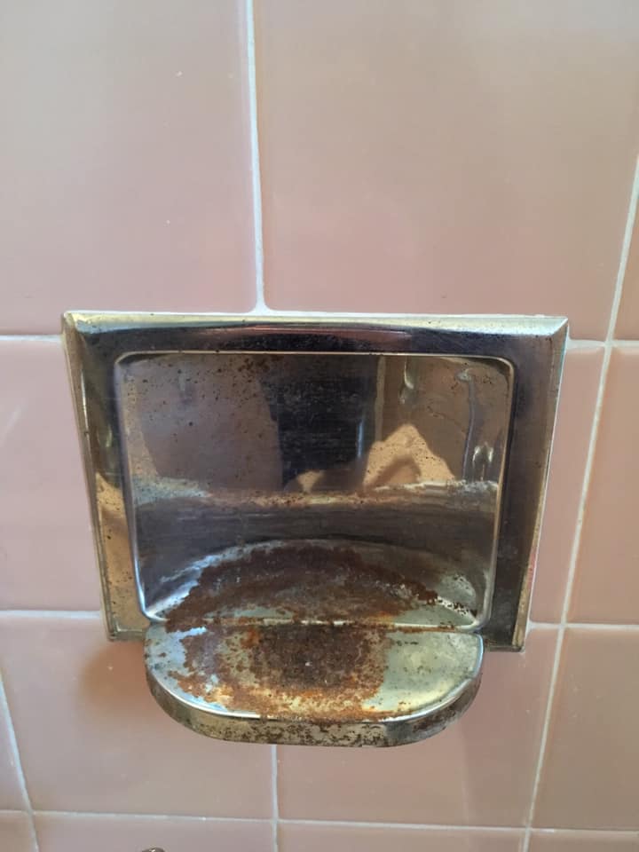 Bath/shower soap holder - how do I get that black grime off