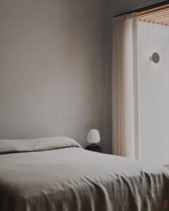 A Coastal Escape with Mid-Century Flair - bedroom
