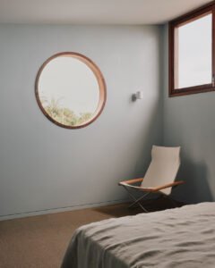 A Coastal Escape with Mid-Century Flair - bedroom