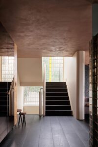 Coastal home boutique hotel renovation - staircase