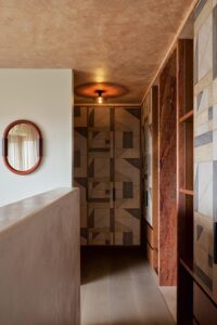 Coastal home boutique hotel renovation - second floor