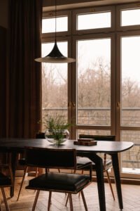 Modernist apartment renovation in Warsaw - dining area