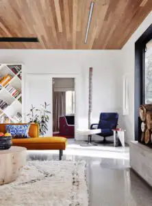 A thoughtful interior renovation blending art deco and modern - living room