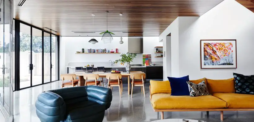 A thoughtful interior renovation blending art deco and modern - living room