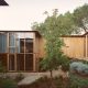 Wood-paneled courtyard house -living room view