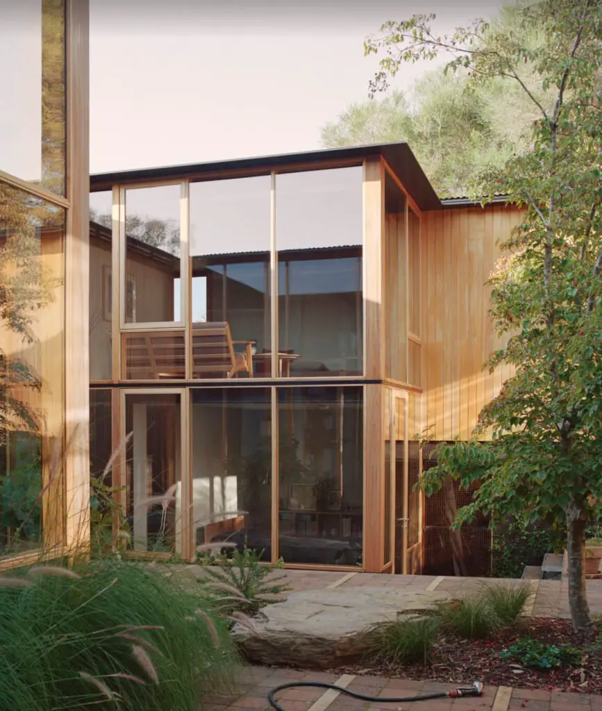 Wood-paneled courtyard house -living room view