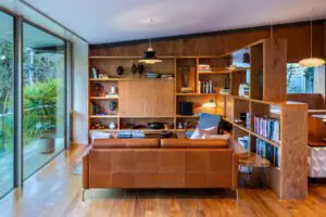 A modern house designed to showcase art and midcentury lights - living
