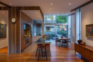 A modern house designed to showcase art and midcentury lights - kitchen