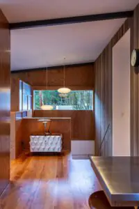A modern house designed to showcase art and midcentury lights - kitchen