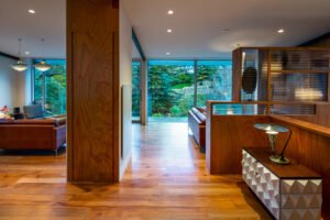 A modern house designed to showcase art and midcentury lights - living