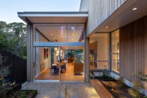 modern house designed to showcase art and midcentury lights - staircase