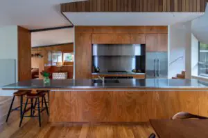 A modern house designed to showcase art and midcentury lights - kitchen