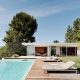 midcentury renovation in clear oak - pool view