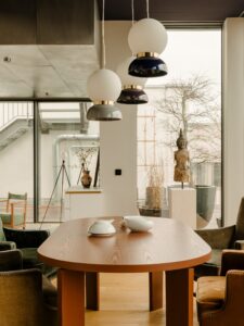 midcentury design reinterpretation in a berlin rooftop - dining area