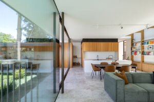 modernist glass box extension 1890 cottage - living room
