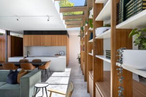 modernist glass box extension 1890 cottage - living room