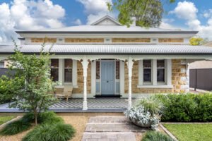 modernist glass box extension 1890 cottage - facade
